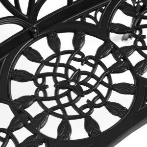 Floral detail on black cast aluminum garden bench backrest