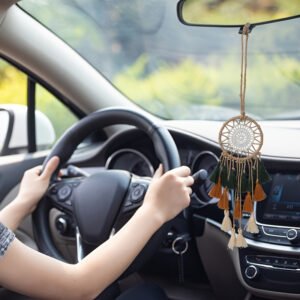 Mini tricolor dream catcher displayed in a car interior