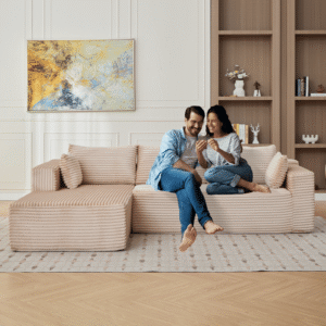 Beige corduroy modular sectional with chaise in a living room
